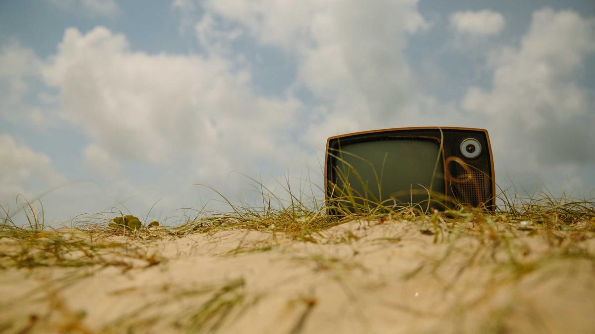 Symbolbild zum Thema Urlaub Kleider Strand